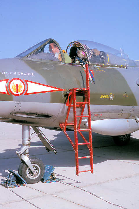 http://www.radfanhunters.co.uk/Images-43/1%20Sqn%20pilot%20sitting%20in%20Hunter_Ksar_1965_WM.jpg